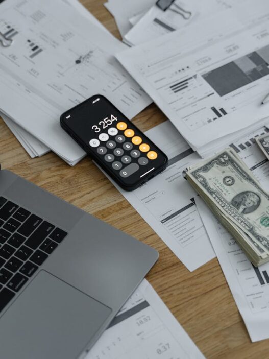 banknotes and calculator on the table