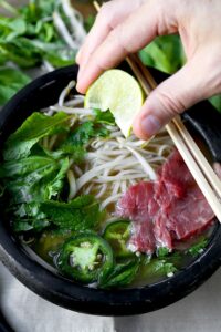 Easy Pho Soup - Slurp your noodles with abandon in 30 minutes with this Easy Pho Soup Recipe! A quick, satisfying and full-flavor version of Vietnam’s national dish. Recipe, soup, Vietnamese food, noodle soup, healthy, pho soup