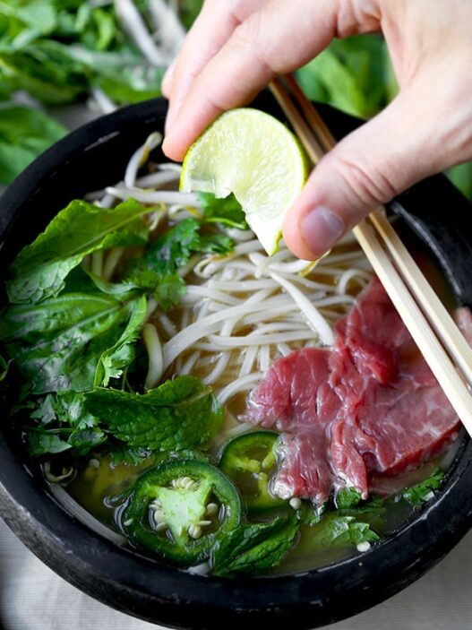 Easy Pho Soup - Slurp your noodles with abandon in 30 minutes with this Easy Pho Soup Recipe! A quick, satisfying and full-flavor version of Vietnam’s national dish. Recipe, soup, Vietnamese food, noodle soup, healthy, pho soup