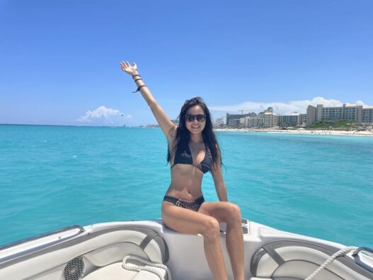 girlon the boat nearby Hotel Riu, Cancun, Mexico
