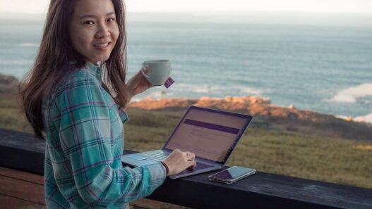 girl-working-laptop-digital-nomad-Timber-Cove-Resort-California-USA