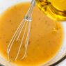 whisking salad dressing