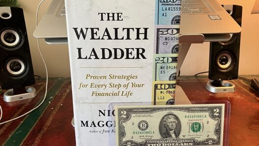 wealth ladder book + $2 note