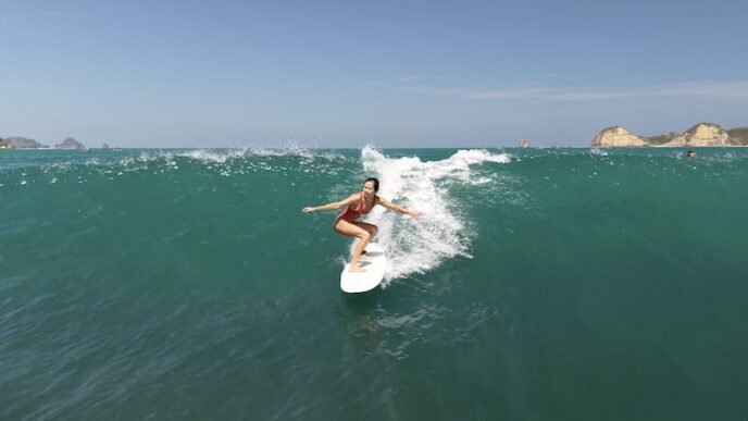 surfing girl, lombok indonesia